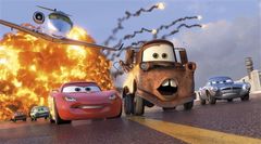 FILE - In this file film publicity image released by Disney-Pixar, animated characters Lightning McQueen, voiced by Owen Wilson, foreground left, Mater, voiced by Larry the Cable Guy, center, and Finn McMissile, voiced by Michael Caine, right, are shown in a scene from 'Cars 2.' 'Cars 2' went out this summer in 44 different languages. And every country faced the same problem when it came to dubbing the aw-shucks ramblings of one of the movie's lead characters _ the country bumpkin tow truck Mate
